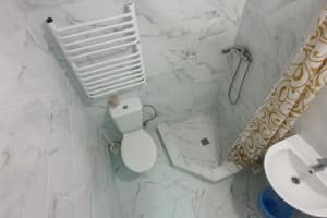 Отель Luxor Inn & Suites. Улучшенный 4-местный с двуспальной кроватью и диван-кроватью  с мини кухней.. 6