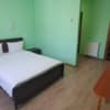 Отель Luxor Inn & Suites. Улучшенный двухместный номер с большой кроватью и кухней с плитой. 3