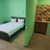 Отель Luxor Inn & Suites. Улучшенный двухместный номер с большой кроватью и кухней с плитой. 5