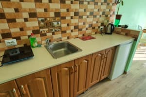 Отель Luxor Inn & Suites. Улучшенный двухместный номер с раздельными кроватями и кухней с плитой. 7