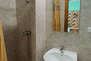 Отель Luxor Inn & Suites. Улучшенный двухместный номер с раздельными кроватями и кухней с плитой. 9