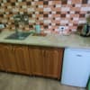 Отель Luxor Inn & Suites. Улучшенный трехместный номер с раздельными кроватями и кухней с плитой. 5