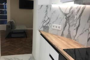 по ул. О. Кобылянской 31 12